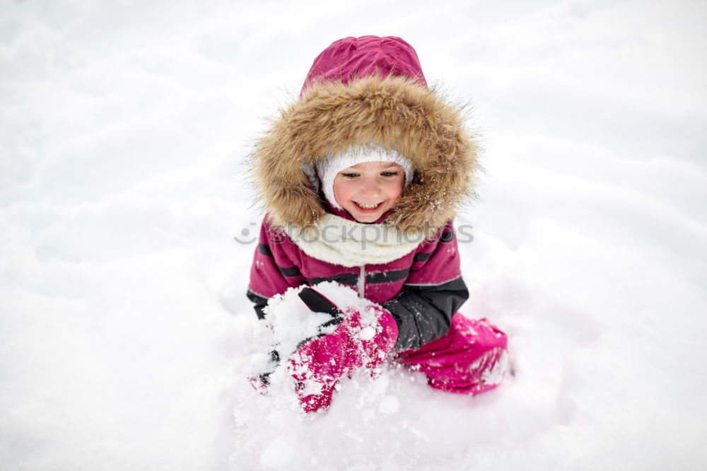 Similar – happy child girl skiing in winter snowy forest