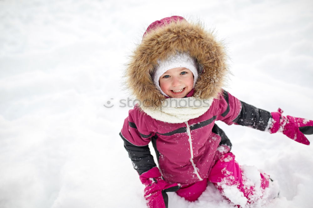 Similar – happy child girl skiing in winter snowy forest