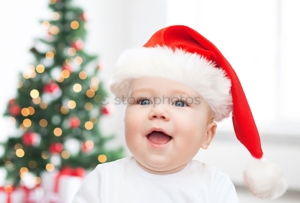 Similar – Image, Stock Photo Young girl decorating Christmas tree with lights at home