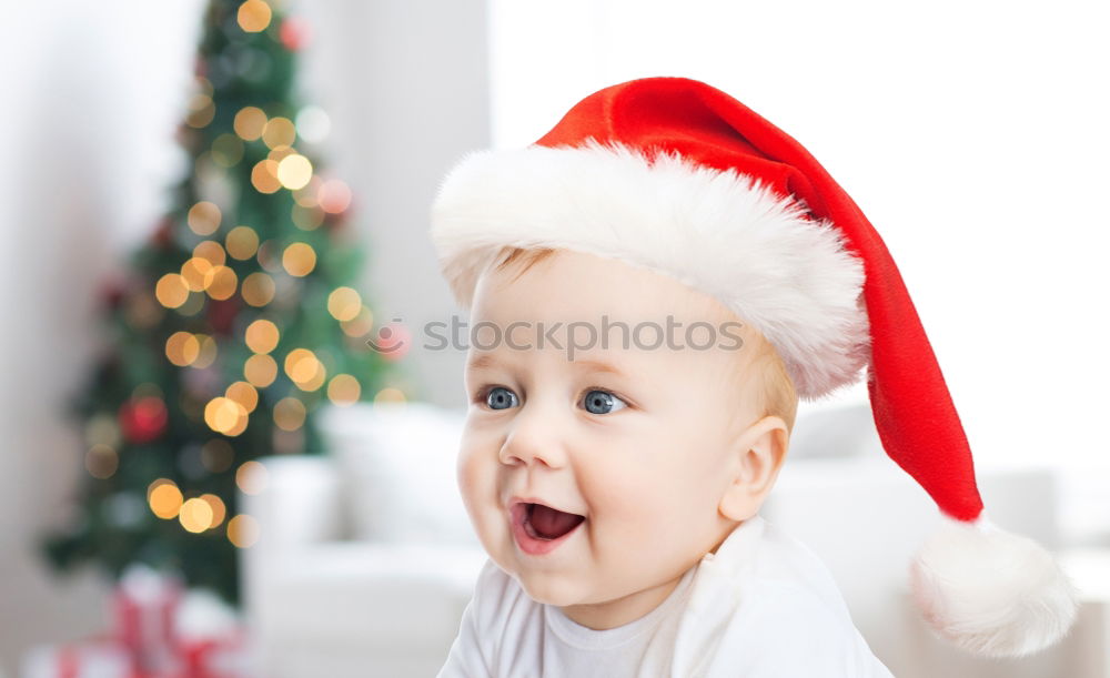 Similar – Image, Stock Photo Young girl decorating Christmas tree with lights at home