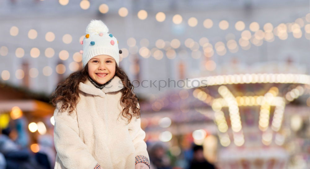 Similar – Image, Stock Photo young happy girl eating caramel apple, walking at christmas city