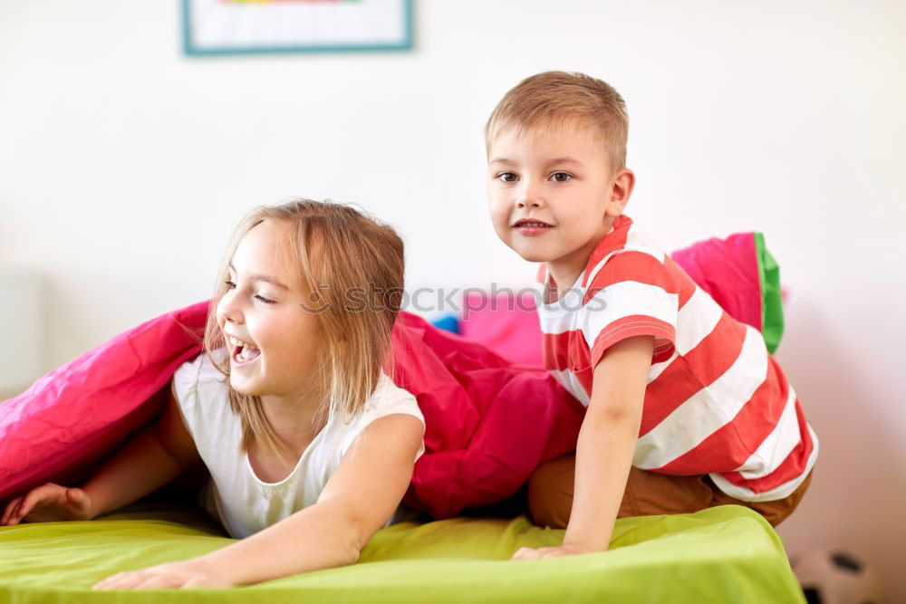 Similar – Image, Stock Photo Boy and girl reading a book