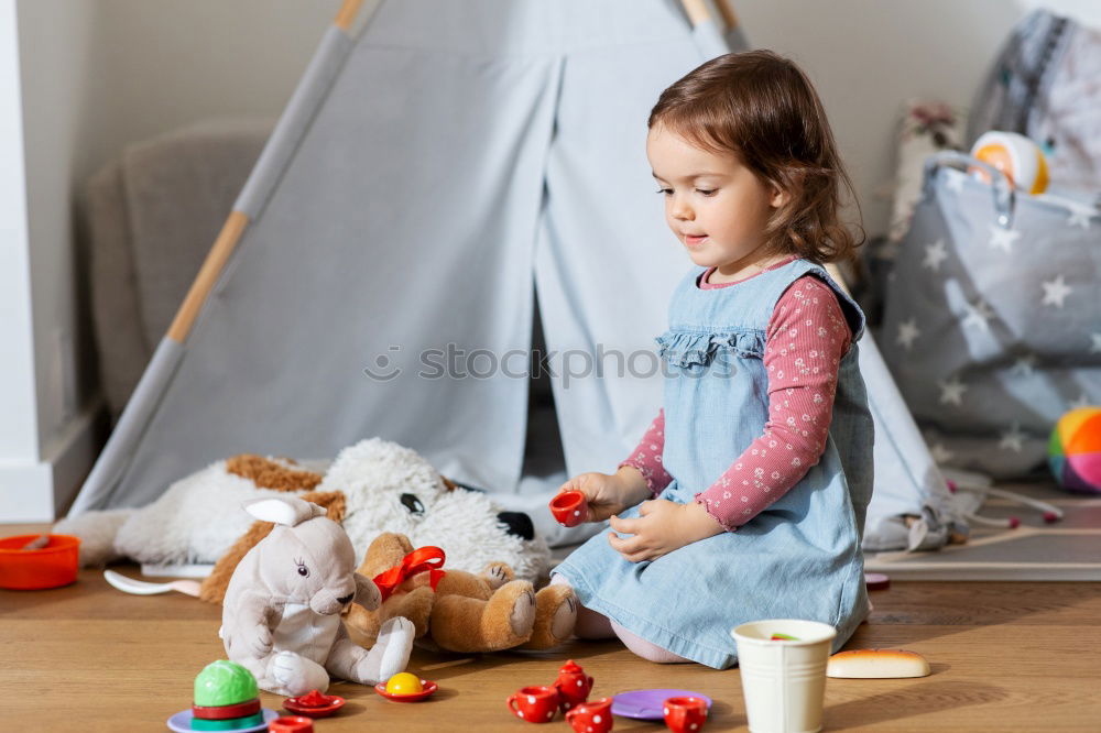 Similar – Image, Stock Photo kid girl playing with dolls at home