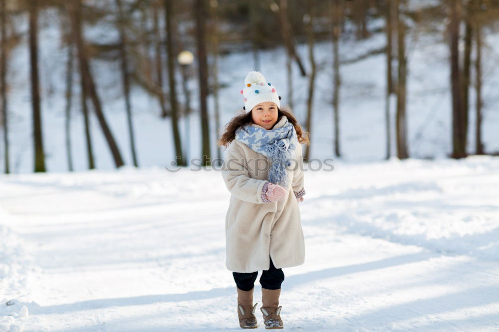 Similar – Image, Stock Photo kid girl helping to clean pathway from snow with showel