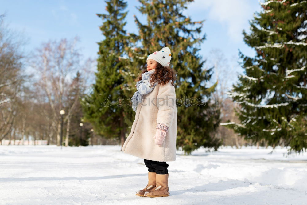 Similar – Image, Stock Photo happy child playing with dog in winter