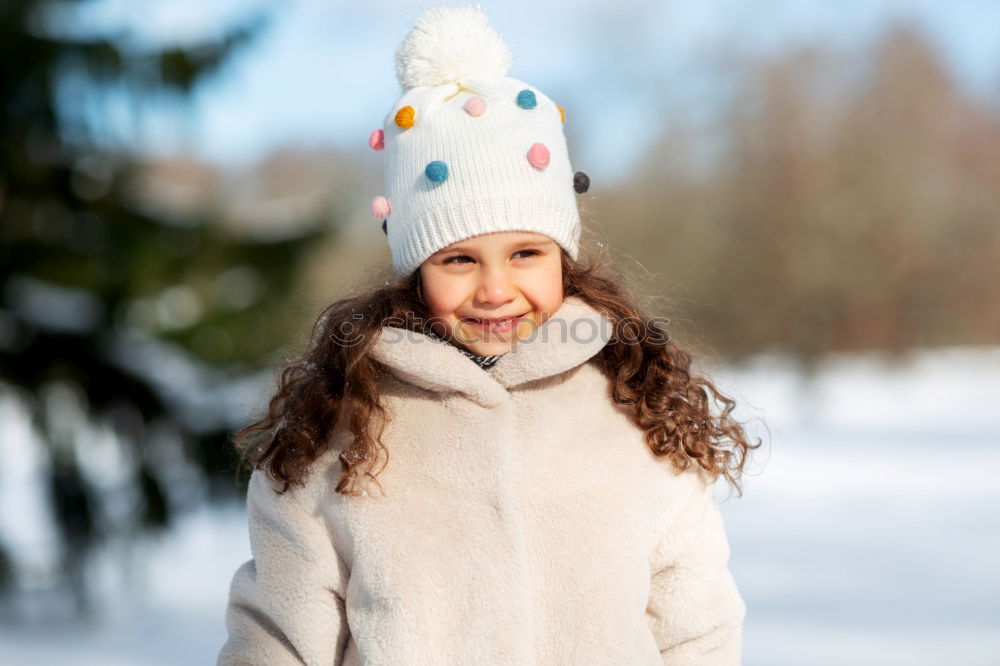 Similar – Image, Stock Photo Winter portrait of happy kid girl playing outdoor