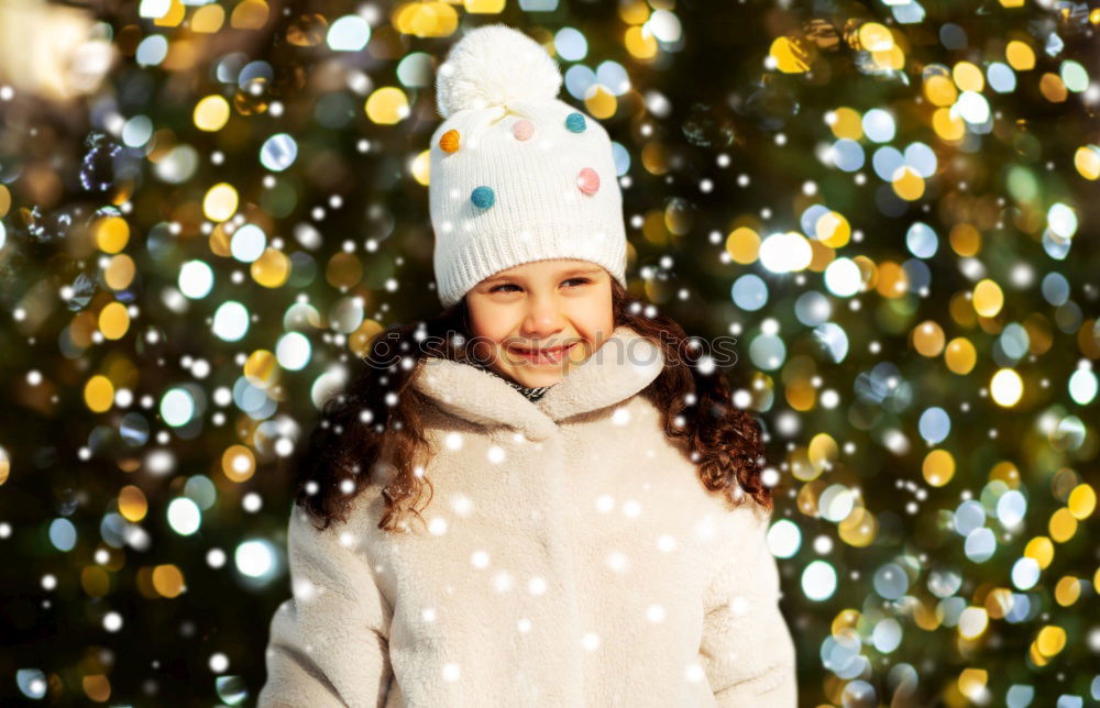 Image, Stock Photo christmas portrait of happy child girl holding burning sparkler