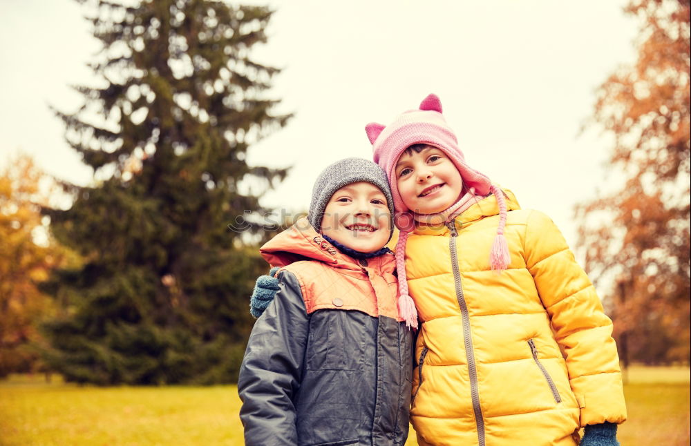 Similar – happy brothers sitting in the park