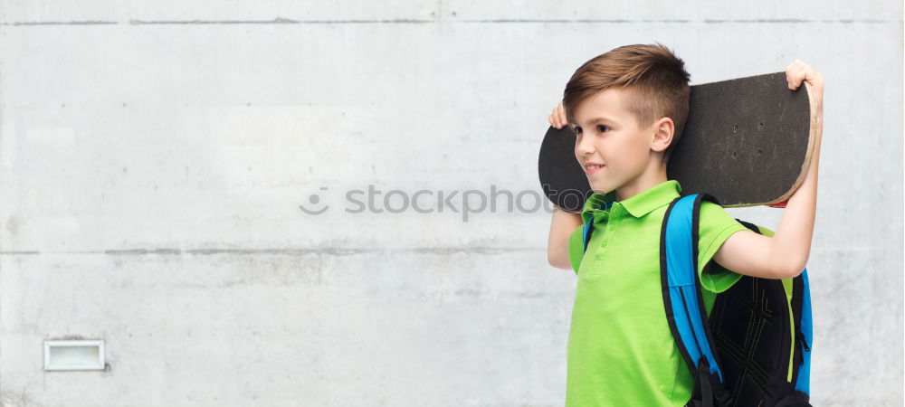 Similar – Image, Stock Photo Close-up of a teenage boy carrying skateboard and smiling