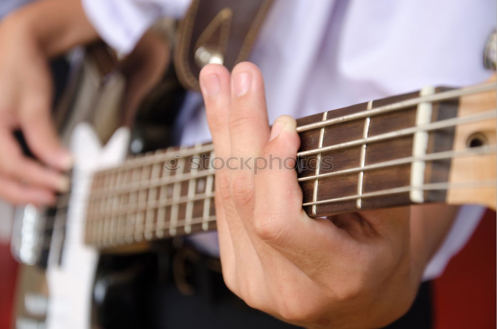 Similar – Man playing electric guitar