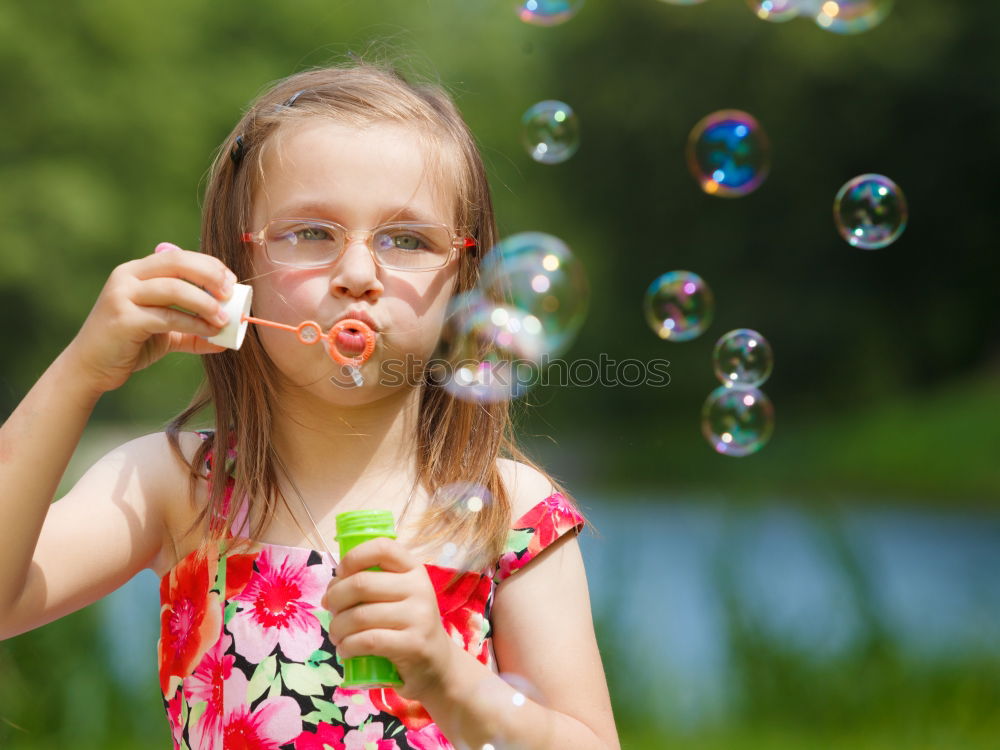 Similar – adorable boy watering the plants