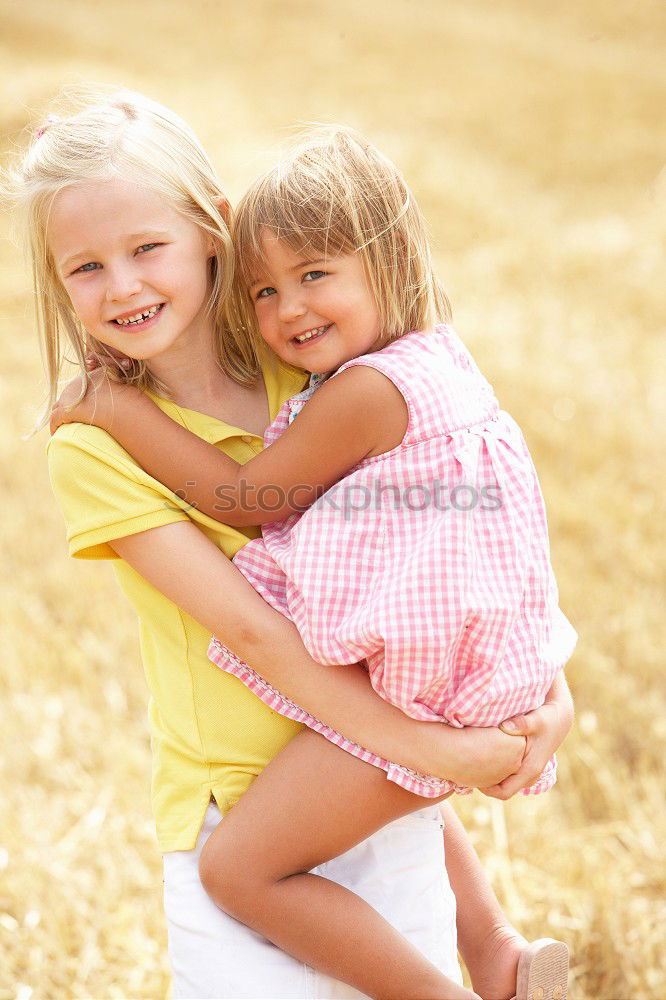 Similar – Image, Stock Photo Sister and brother playing on the beach at the day time. Concept Brother And Sister Together Forever