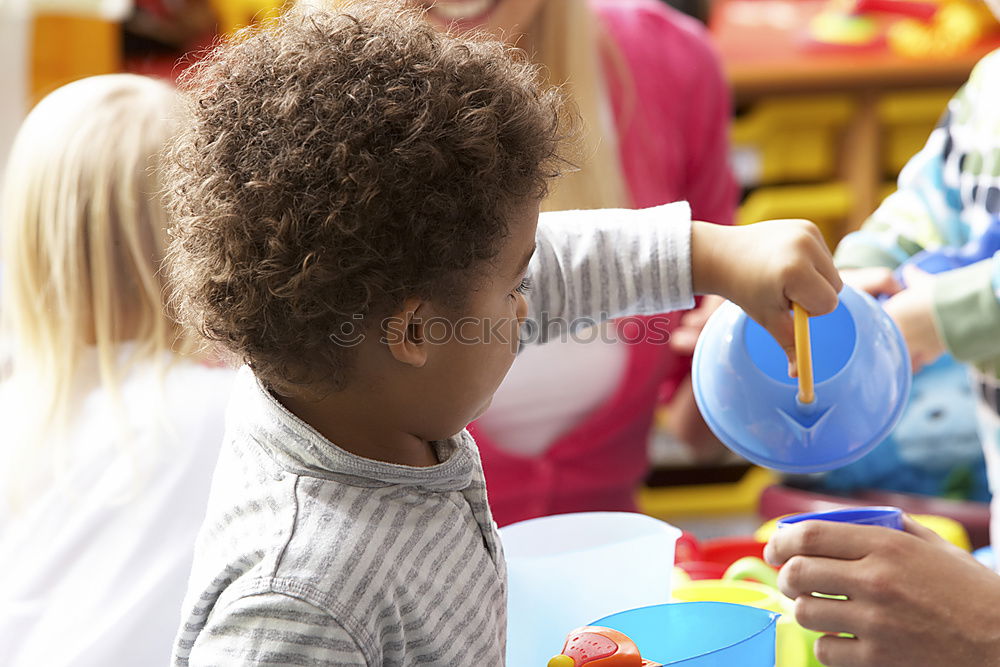 Similar – Happy baby playing with toy blocks.