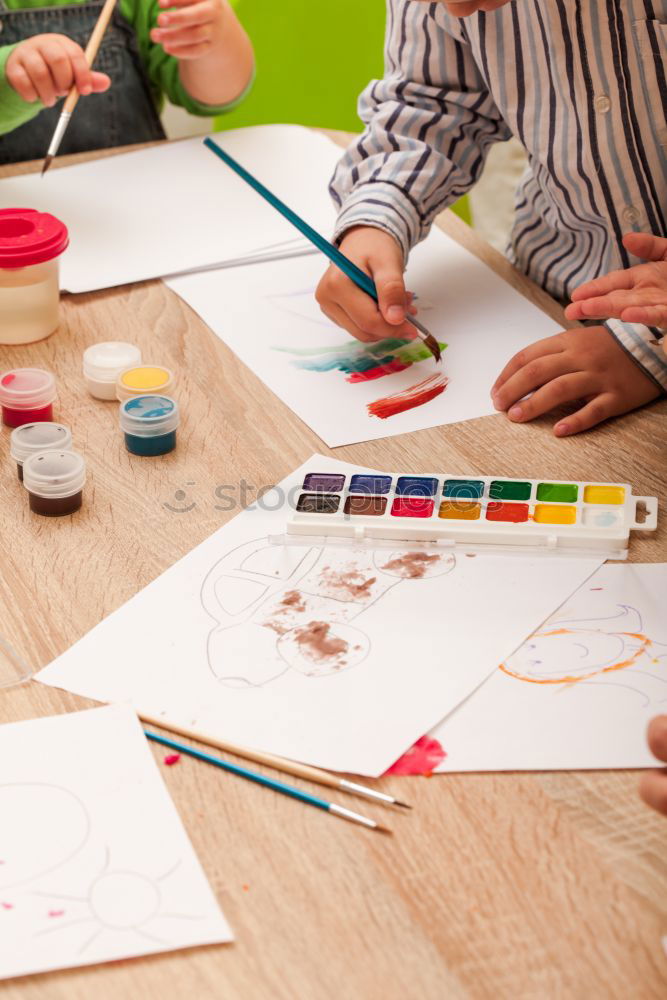 Similar – Image, Stock Photo Girl coloring a simple sketch of a skull