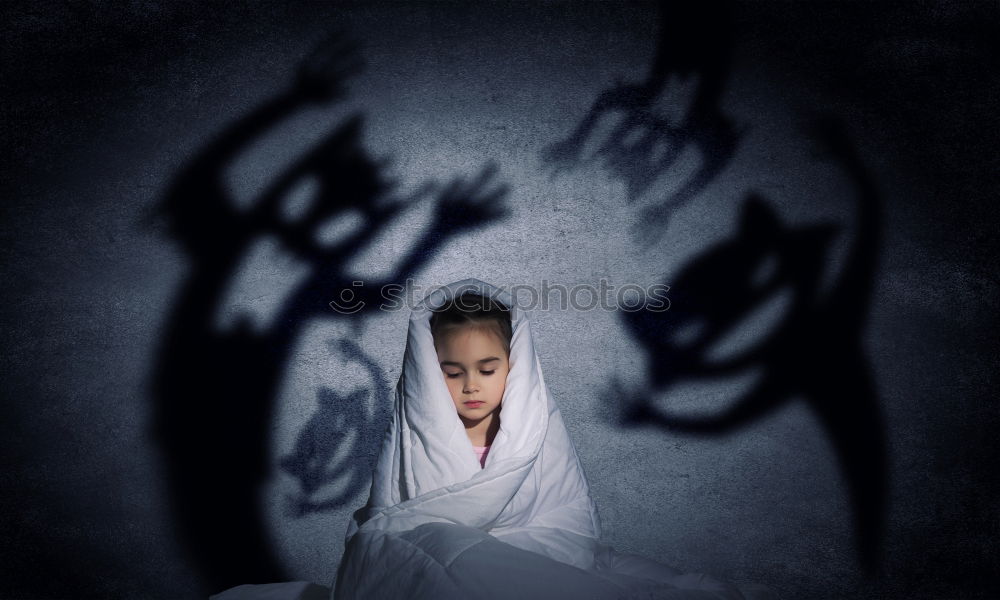 Similar – Image, Stock Photo Boy looks surprised under a black blanket