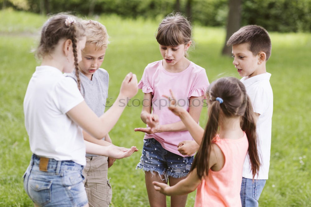 Similar – Happy family in a urban park playing with tablet computer