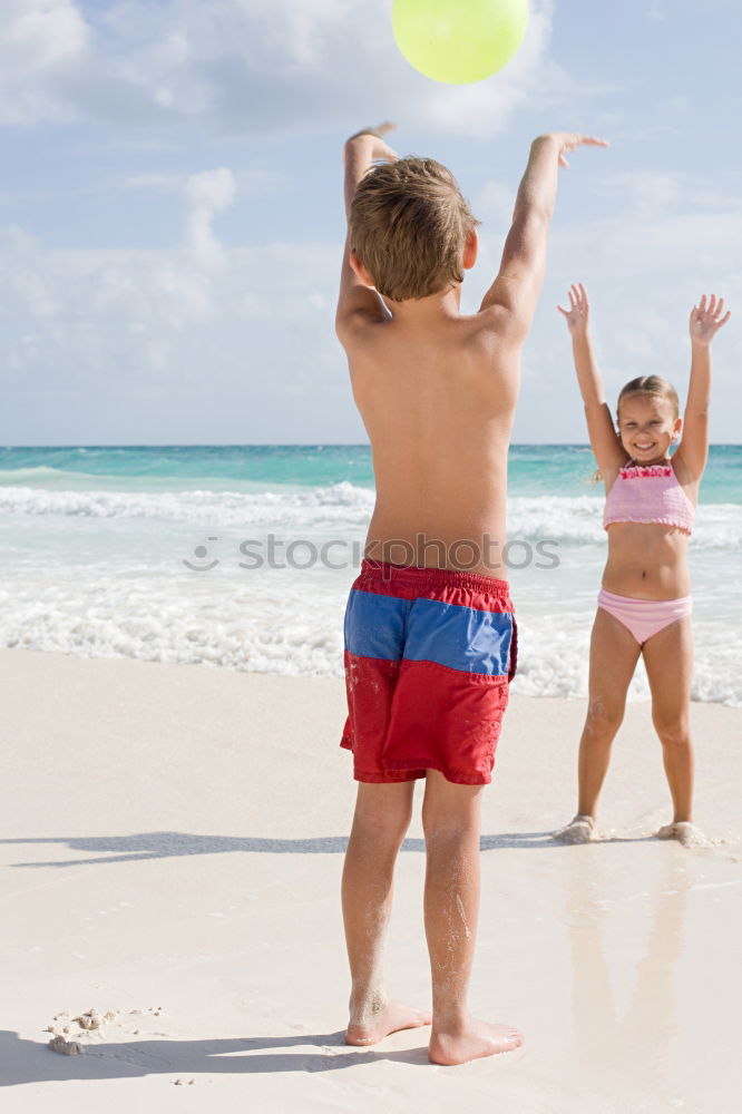 Similar – Two happy children playing on the beach