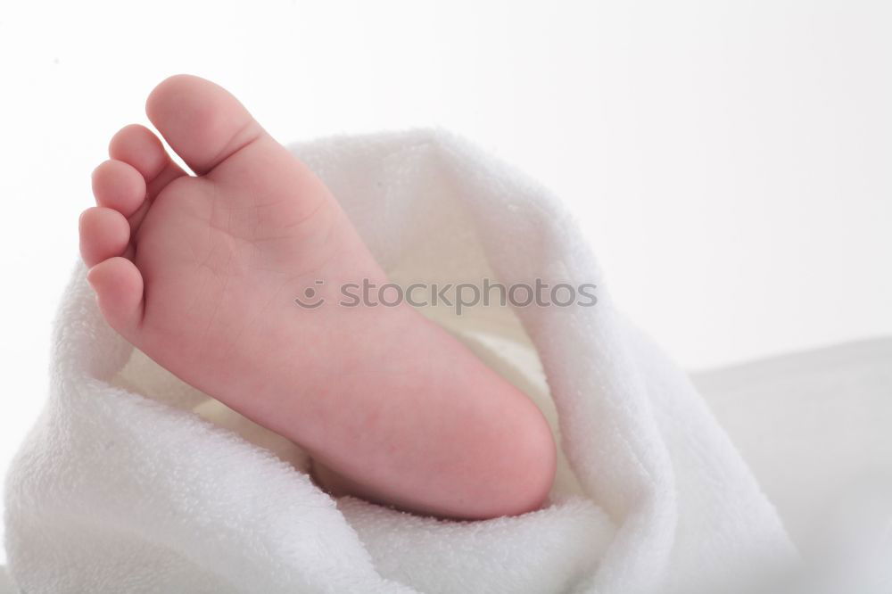 Similar – Image, Stock Photo close up feet of a couple under the white sheets blanket in bed,