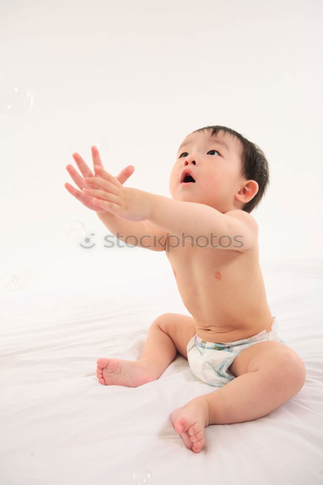 Similar – Baby with one years old getting out of bed