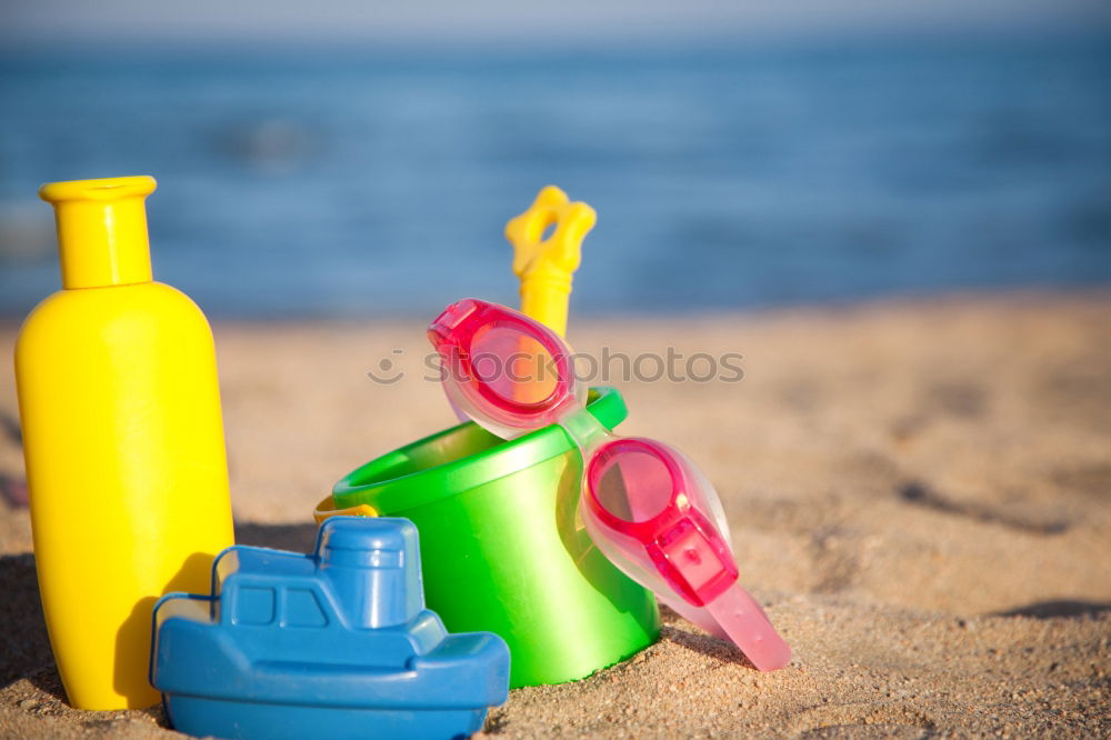 Similar – Image, Stock Photo Sand toys on the beach