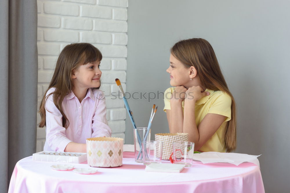 Similar – Two beautiful sister kids eating watermelon ice cream