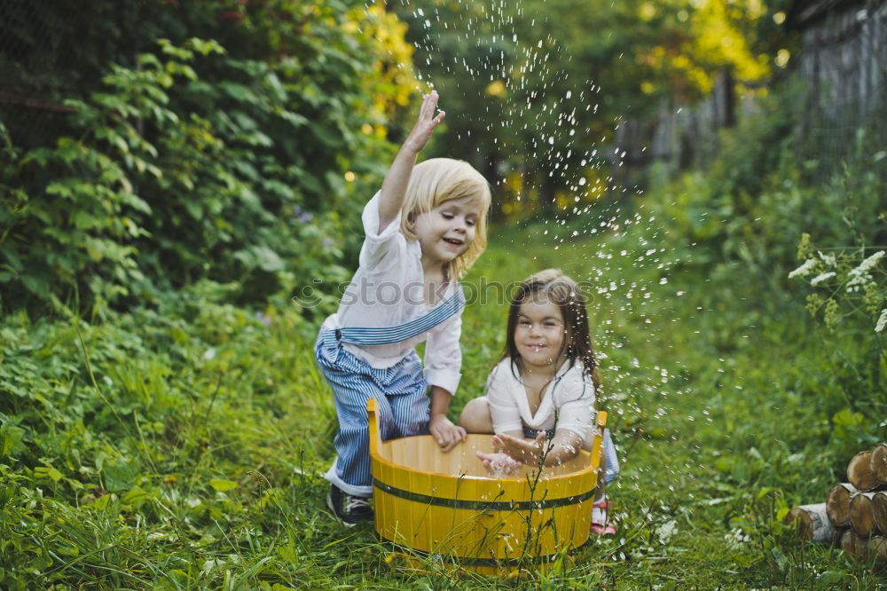 Similar – Image, Stock Photo Boy and girl picking up garbage from ground