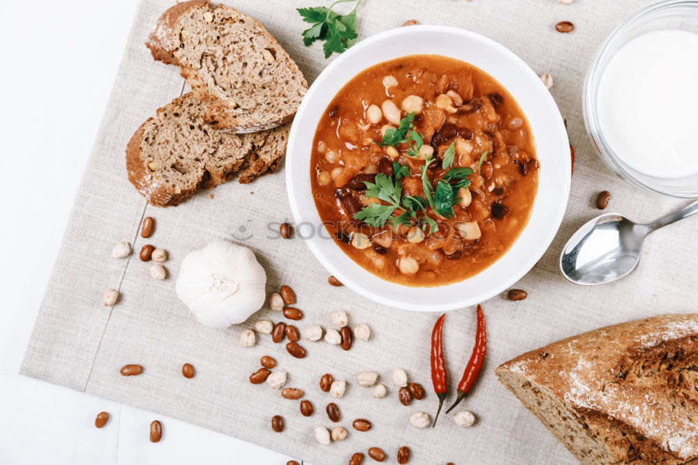 Similar – Image, Stock Photo Vegan lentil soup in bowl with spoon