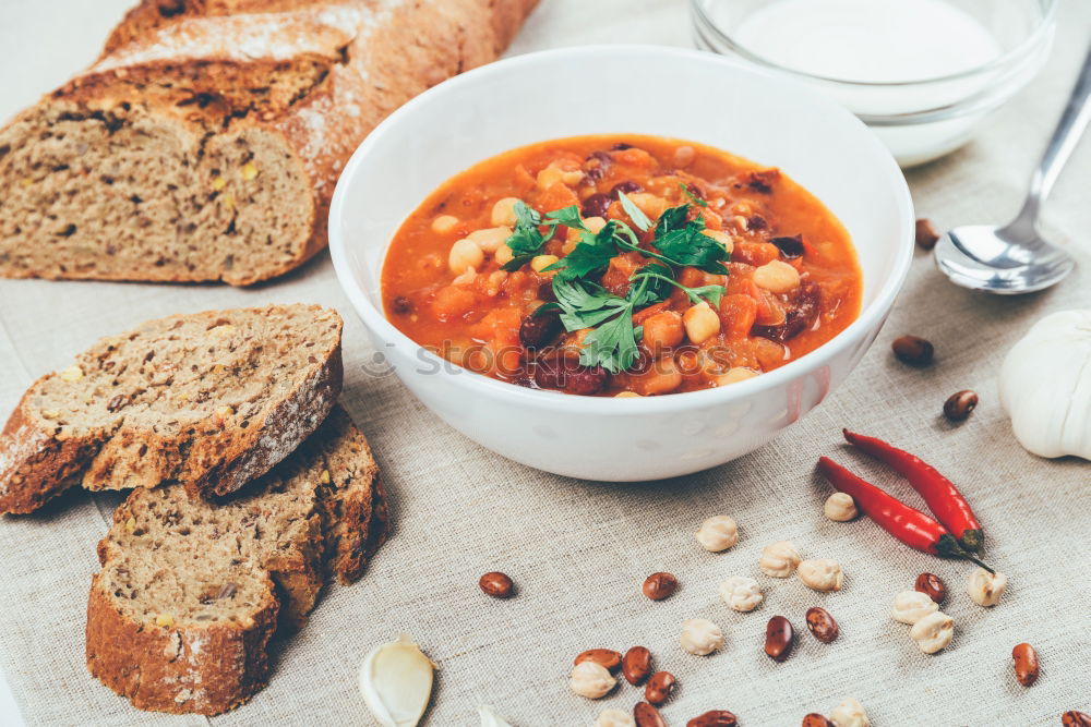 Similar – Image, Stock Photo Chili Beans Stew, Bread Ready To Be Served