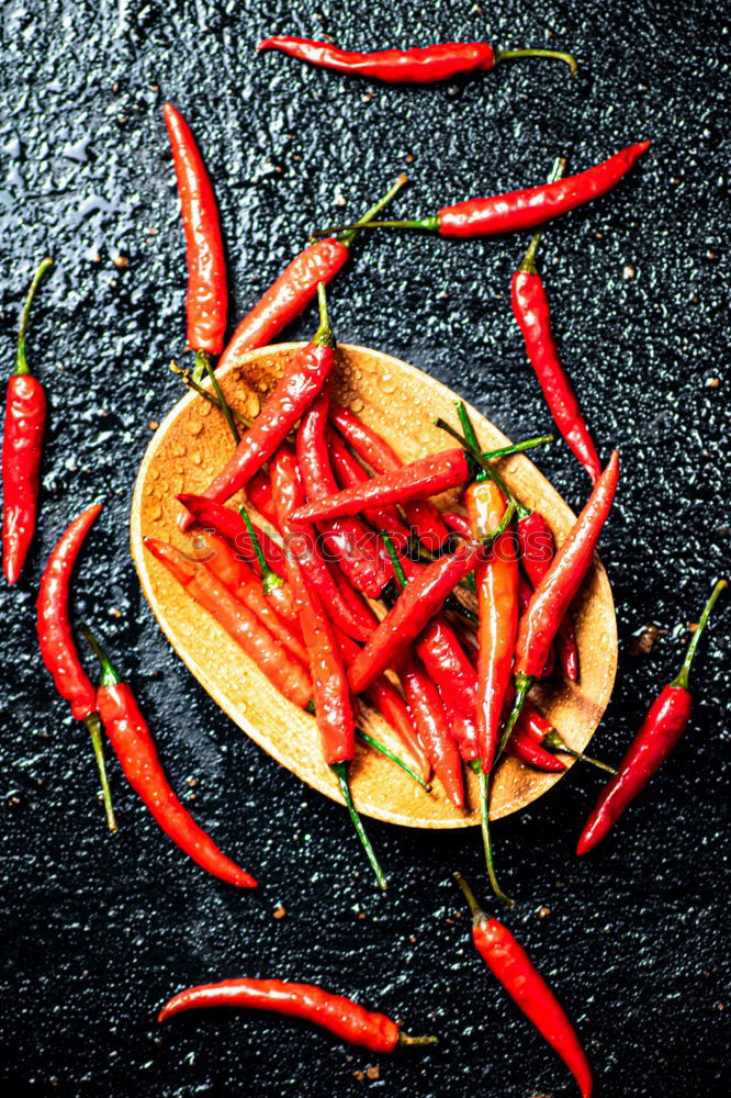 Similar – Image, Stock Photo Fresh red and spicy chilli peppers