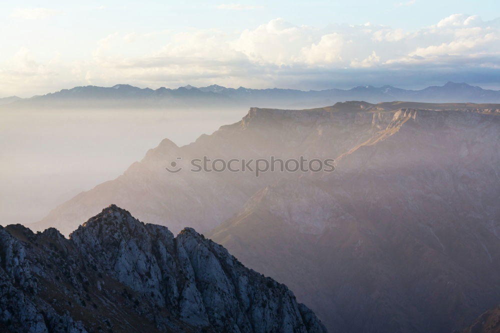 Similar – Image, Stock Photo peaks, rocks, clouds, steep, diffuse