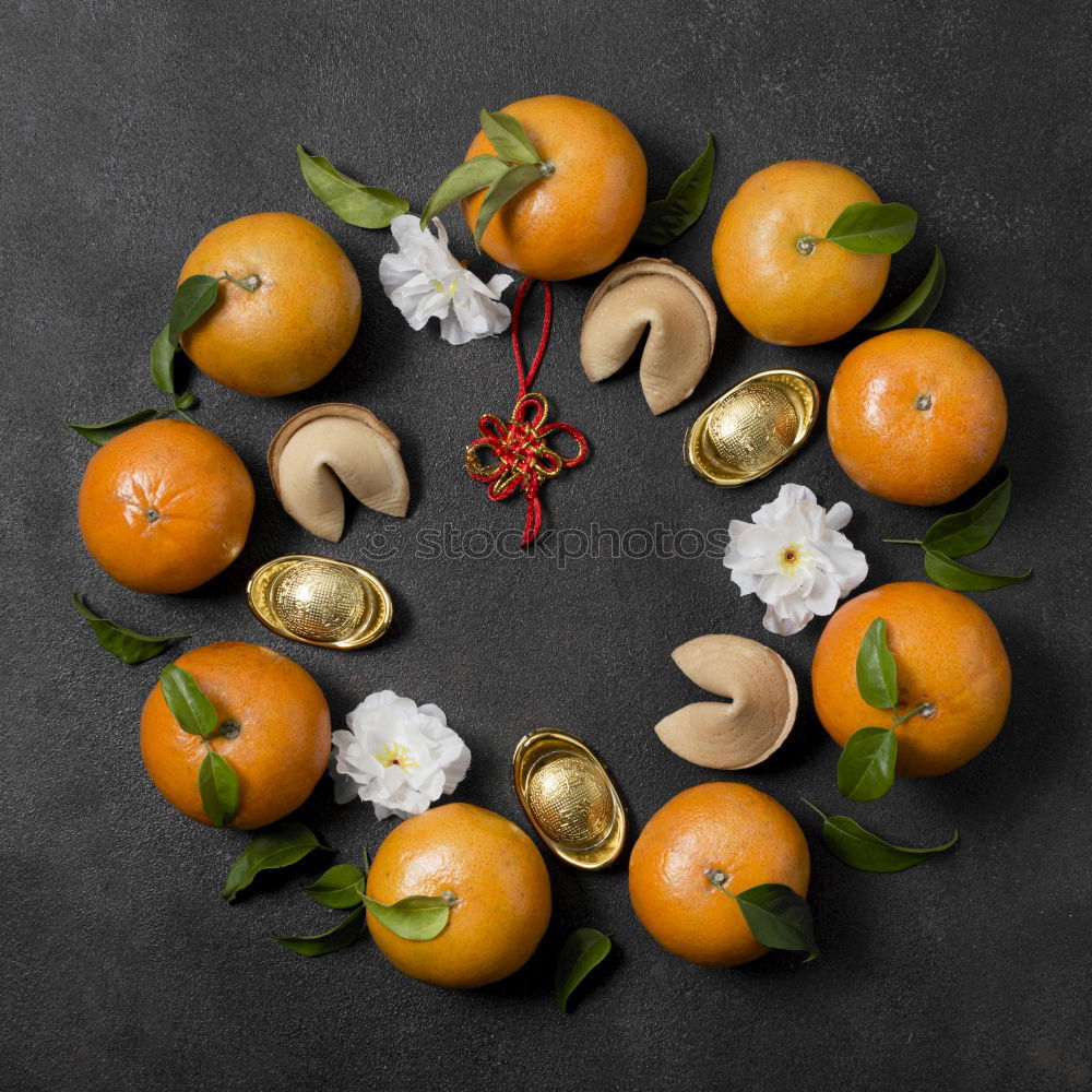 Similar – Oranges on dark background