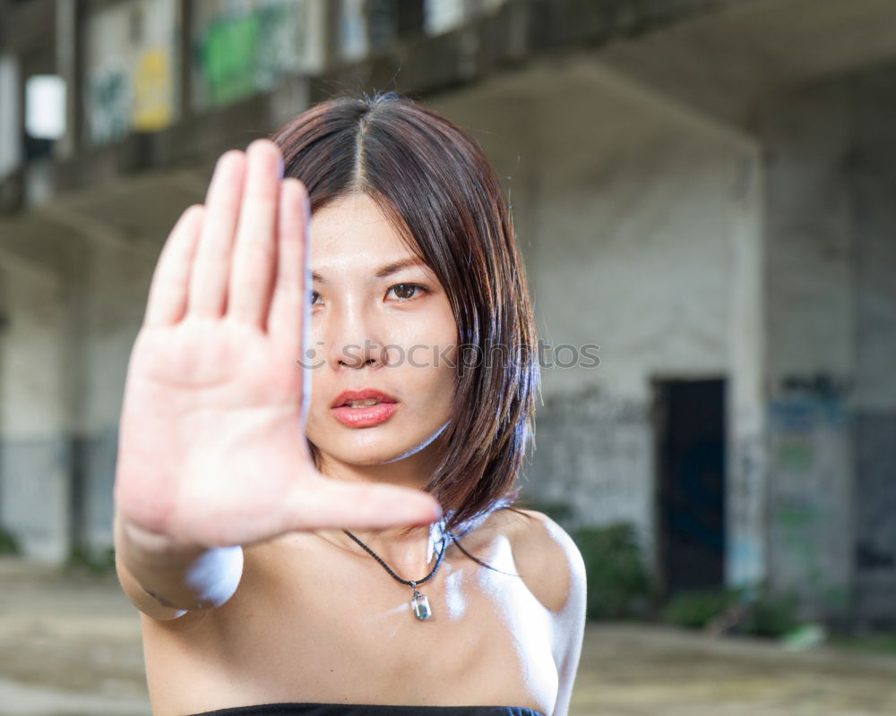 Similar – Image, Stock Photo Cheerful woman gesturing stop