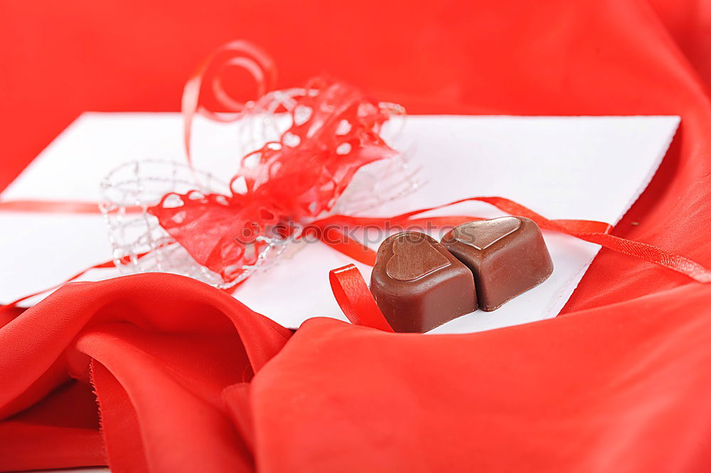 Similar – Red and white gift on red background. Copyspace