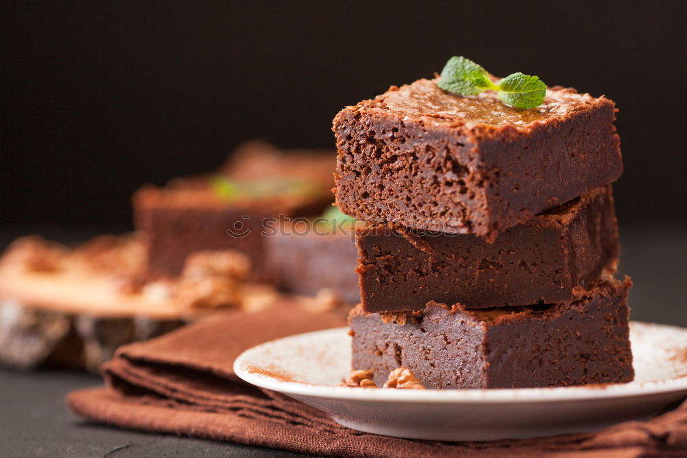 Similar – Image, Stock Photo stack of square pieces of baked brown brownie pie