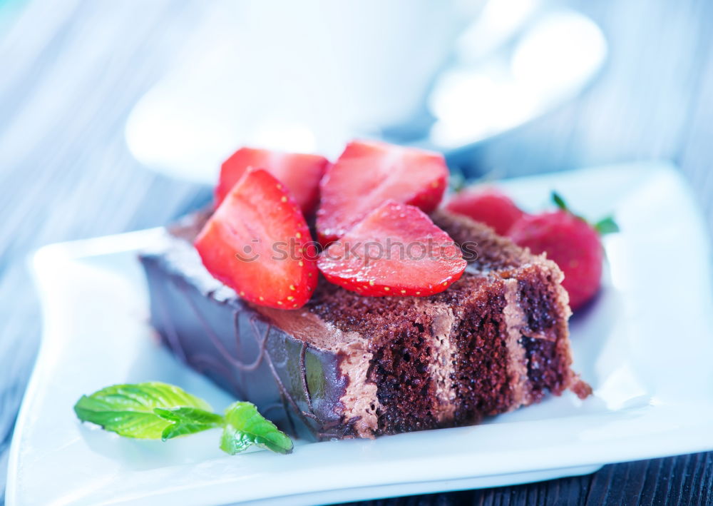 Similar – Image, Stock Photo Chocolate Tiramisu cake with strawberries on black slate