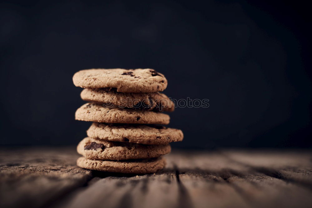 Similar – Image, Stock Photo A few gingerbread cookies wrapped in red ribbon Happy Christmas