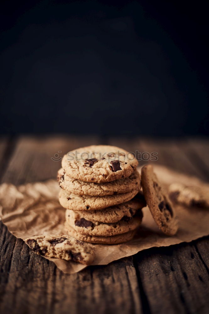 Similar – A few gingerbread cookies wrapped in red ribbon Happy Christmas