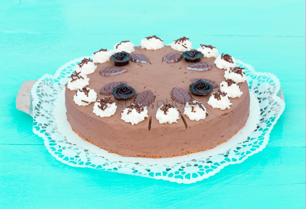 Similar – Image, Stock Photo Chocolate cream cake on blue wood with cake lace