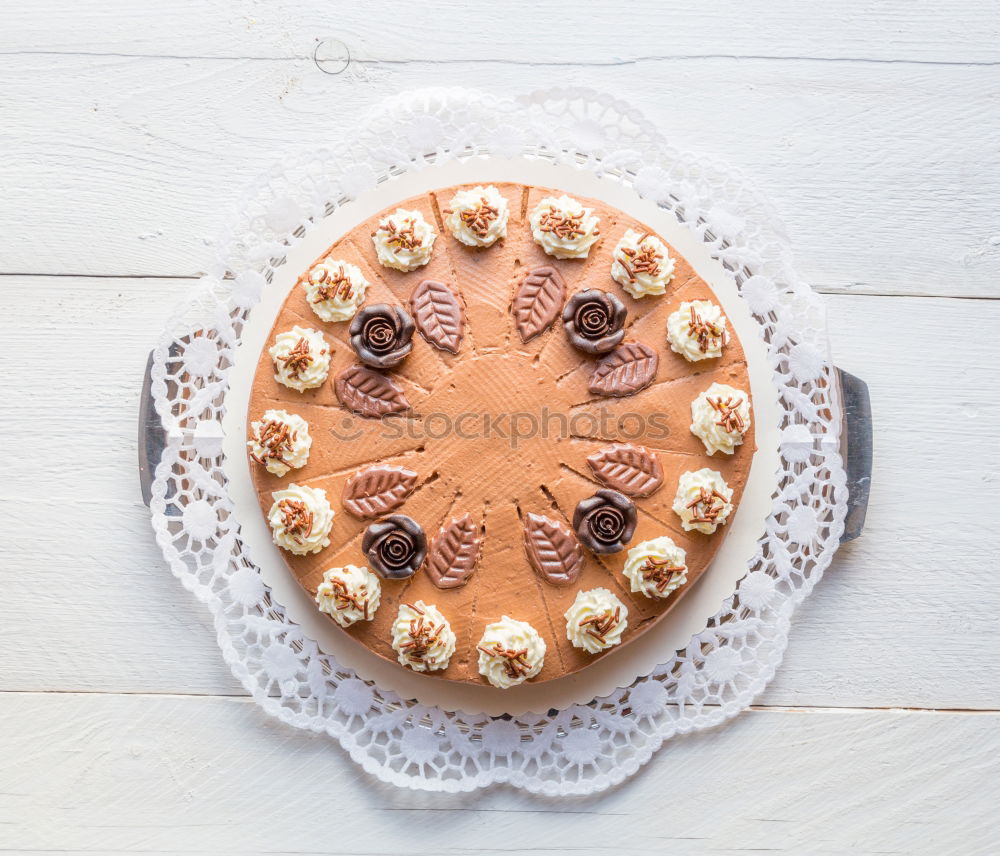 Similar – Image, Stock Photo Chocolate cream cake on blue wood with cake lace