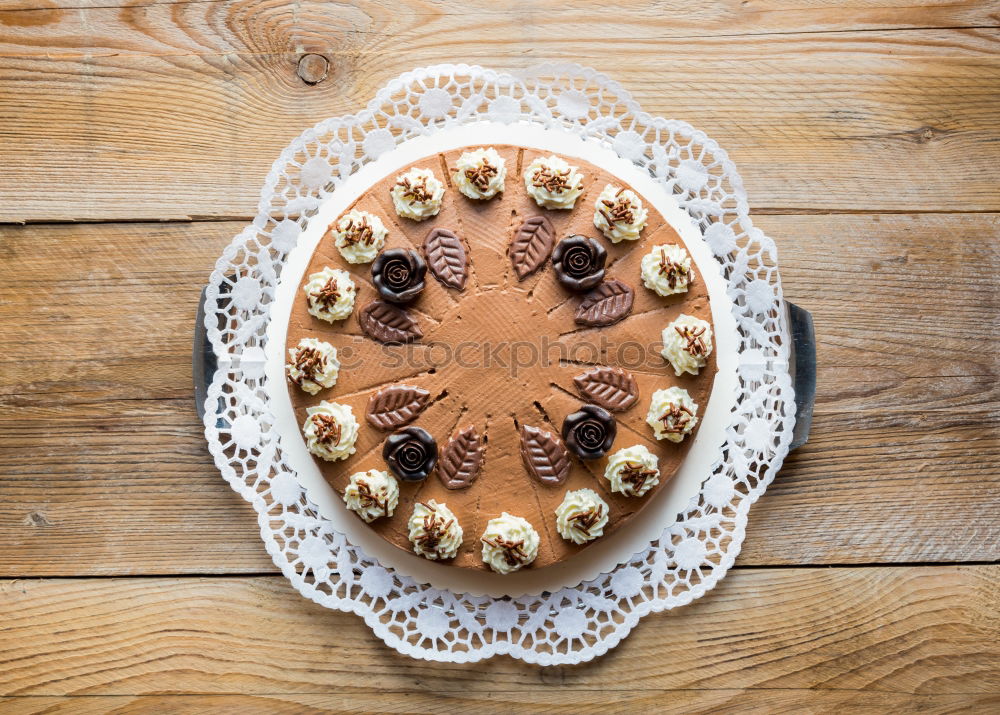 Image, Stock Photo Chocolate cream cake on rustic wood with cake lace