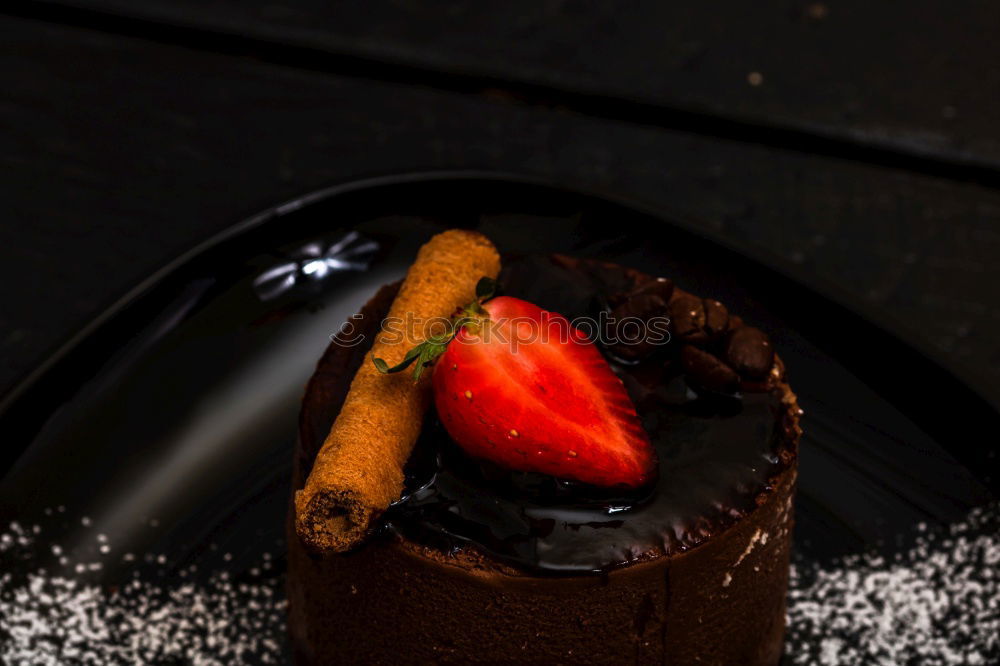 Similar – Image, Stock Photo Chocolate Tiramisu cake with strawberries on black slate