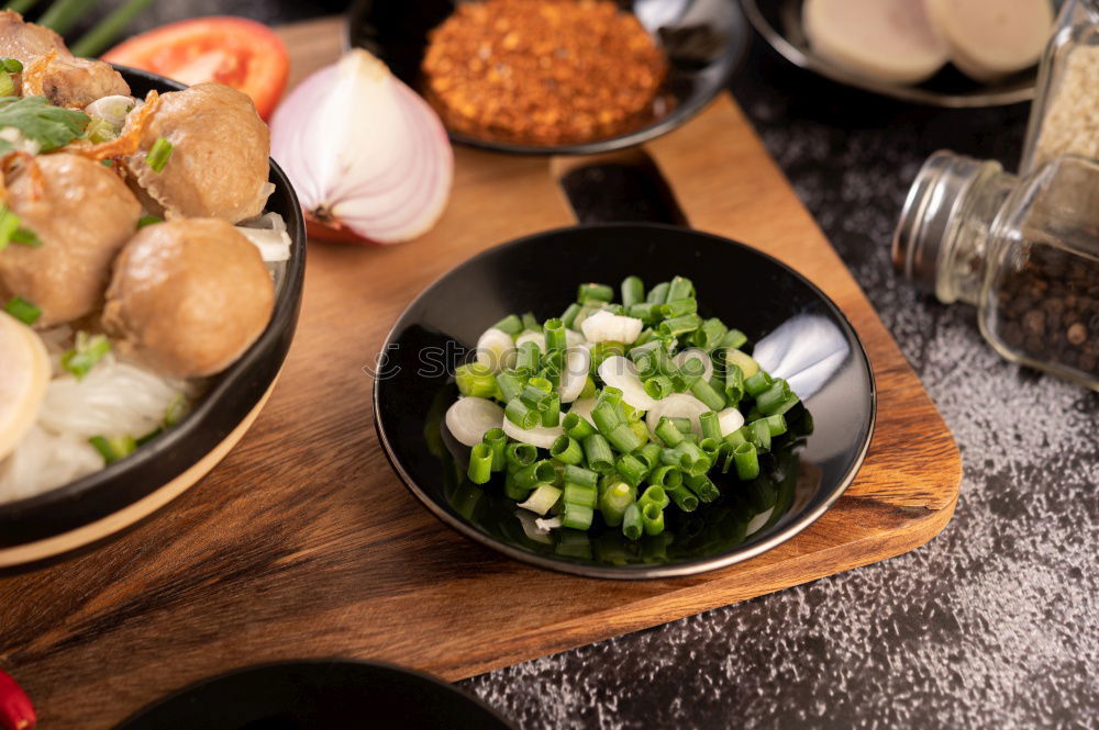 Similar – Geometric bowl of Asian Noodle Soup with chopsticks