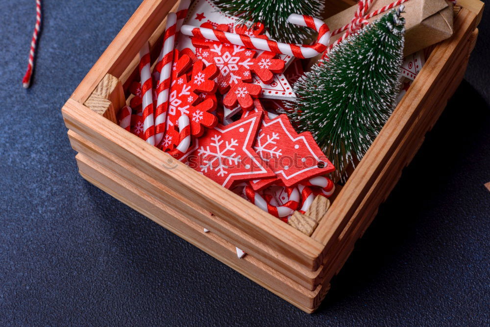 Similar – Image, Stock Photo colourful christmas parcels packed with christmas paper with red bow, on rustic wood. Christmas presents, lie nicely decorated with ribbon on wooden table. Many Christmas parcels wrapped with wrapping paper with Christmas motif. Concept gifts Advent.