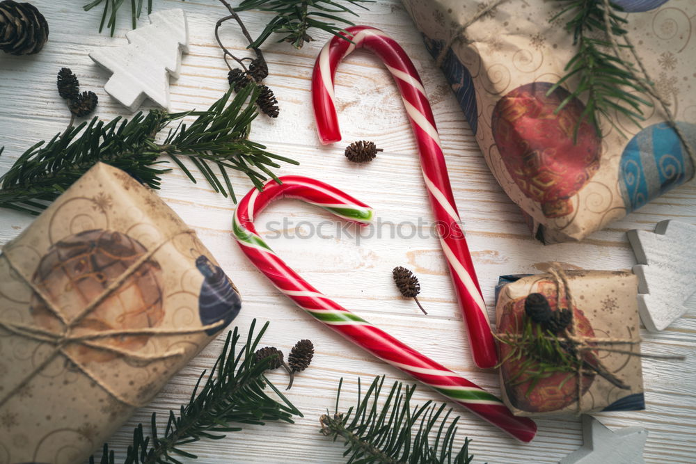 Similar – Woman arms doing christmas decoration in a wood table outdoors