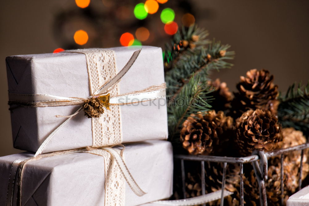 Similar – Foto Bild Papiertüte mit hölzernem Tannenbaum-Anhänger vor dunklem Hintergrund
