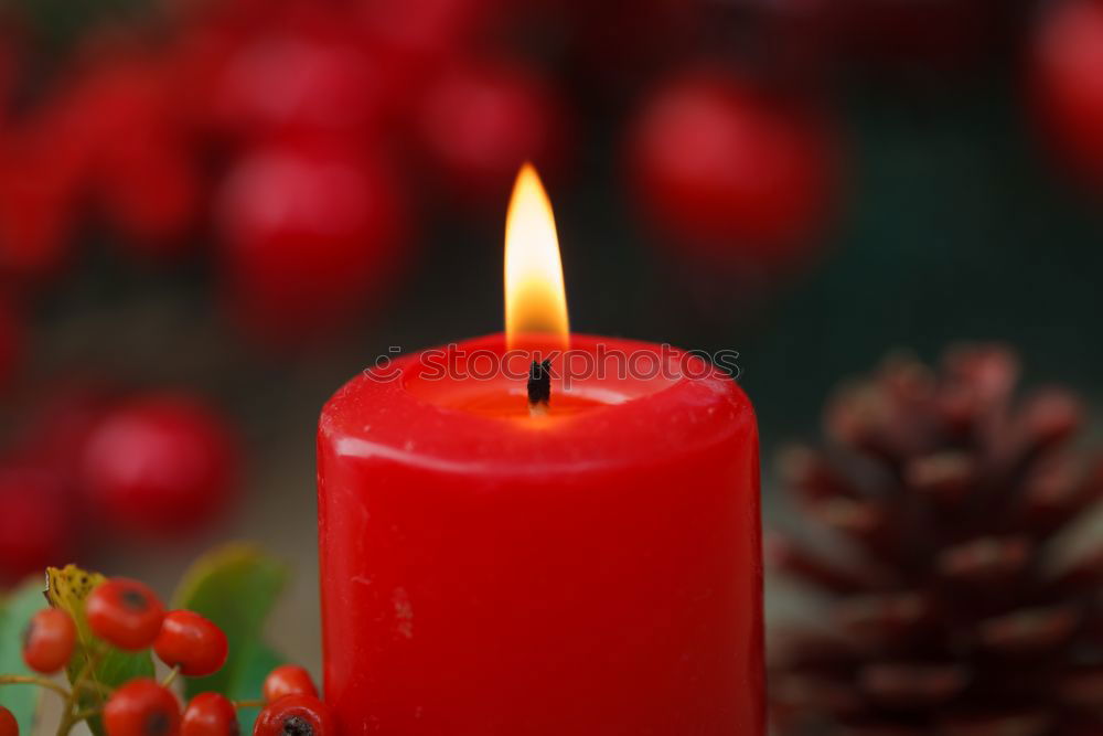 Similar – Christmas Advent wreath with 4 burning candles on old wood