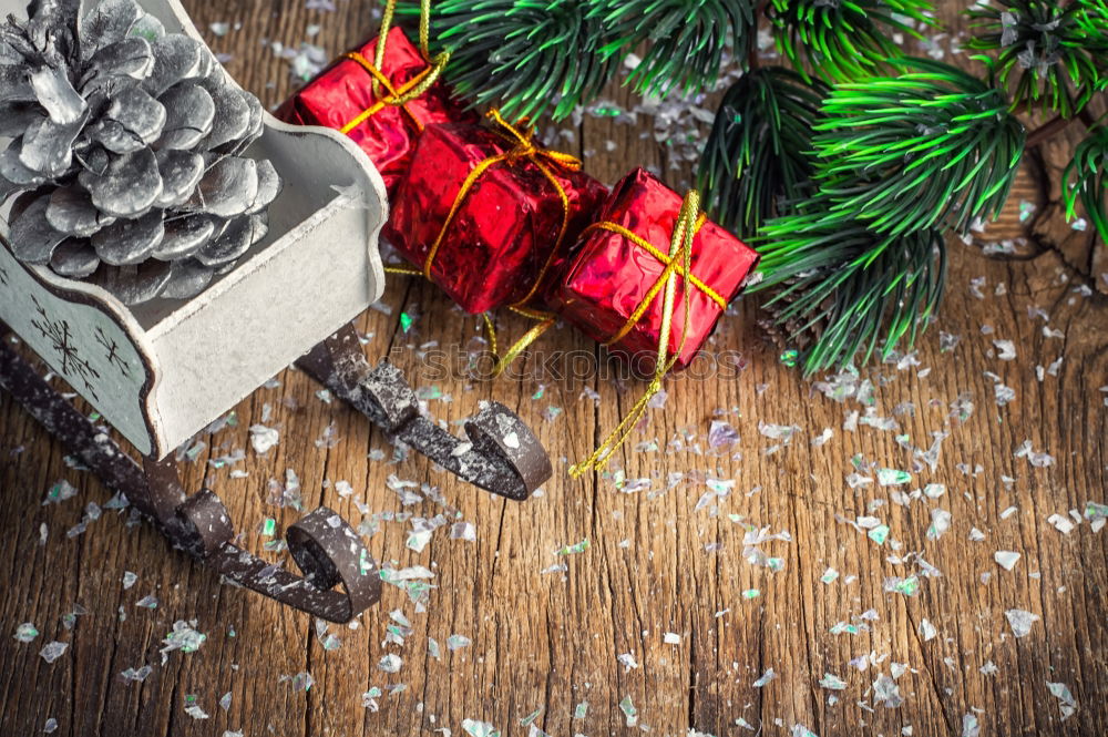 Similar – Woman arms doing christmas decoration in a wood table outdoors