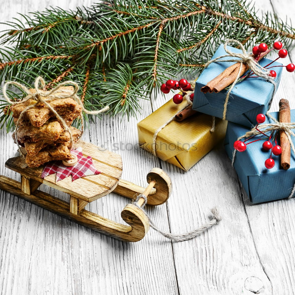 Similar – Christmas decorations over a swing in a park