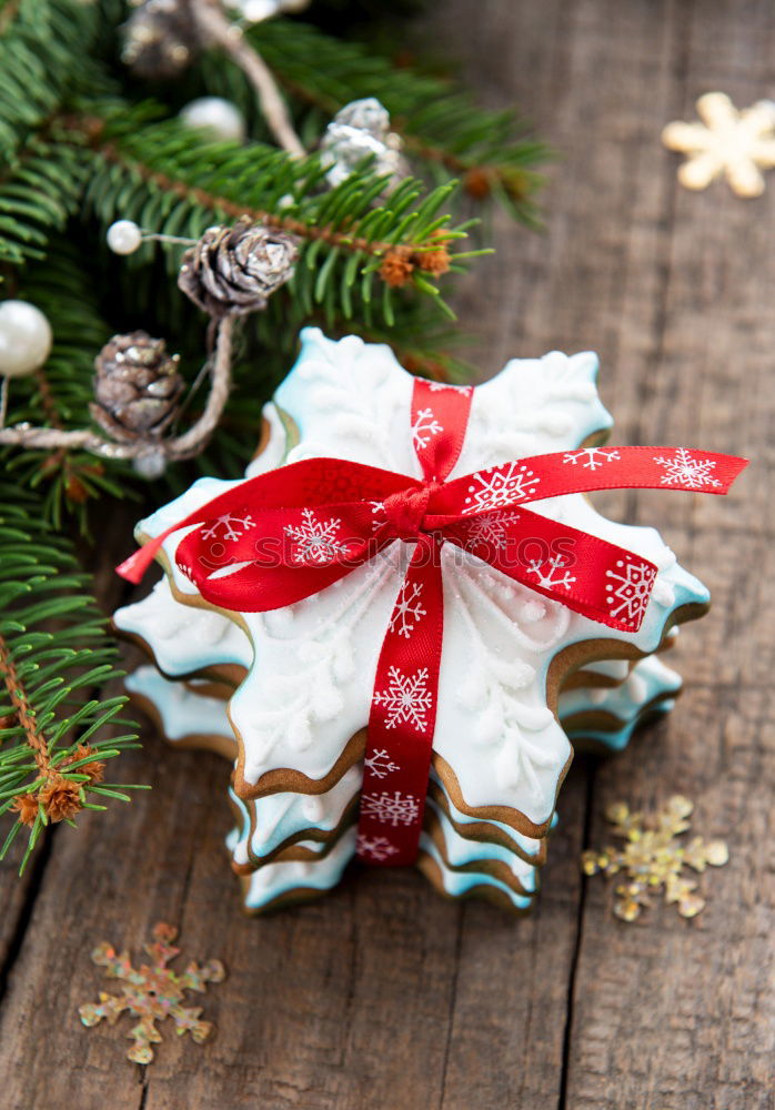 Similar – Image, Stock Photo Christmas parcel with red bow on wooden background.