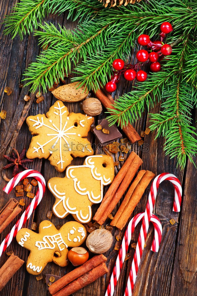 Similar – Gingerbread man with mulled wine, Christmas decoration and cookies